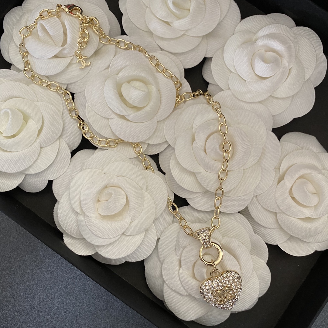 Ch**el Twinkle Heart Chain Necklace Gold Tone For Women