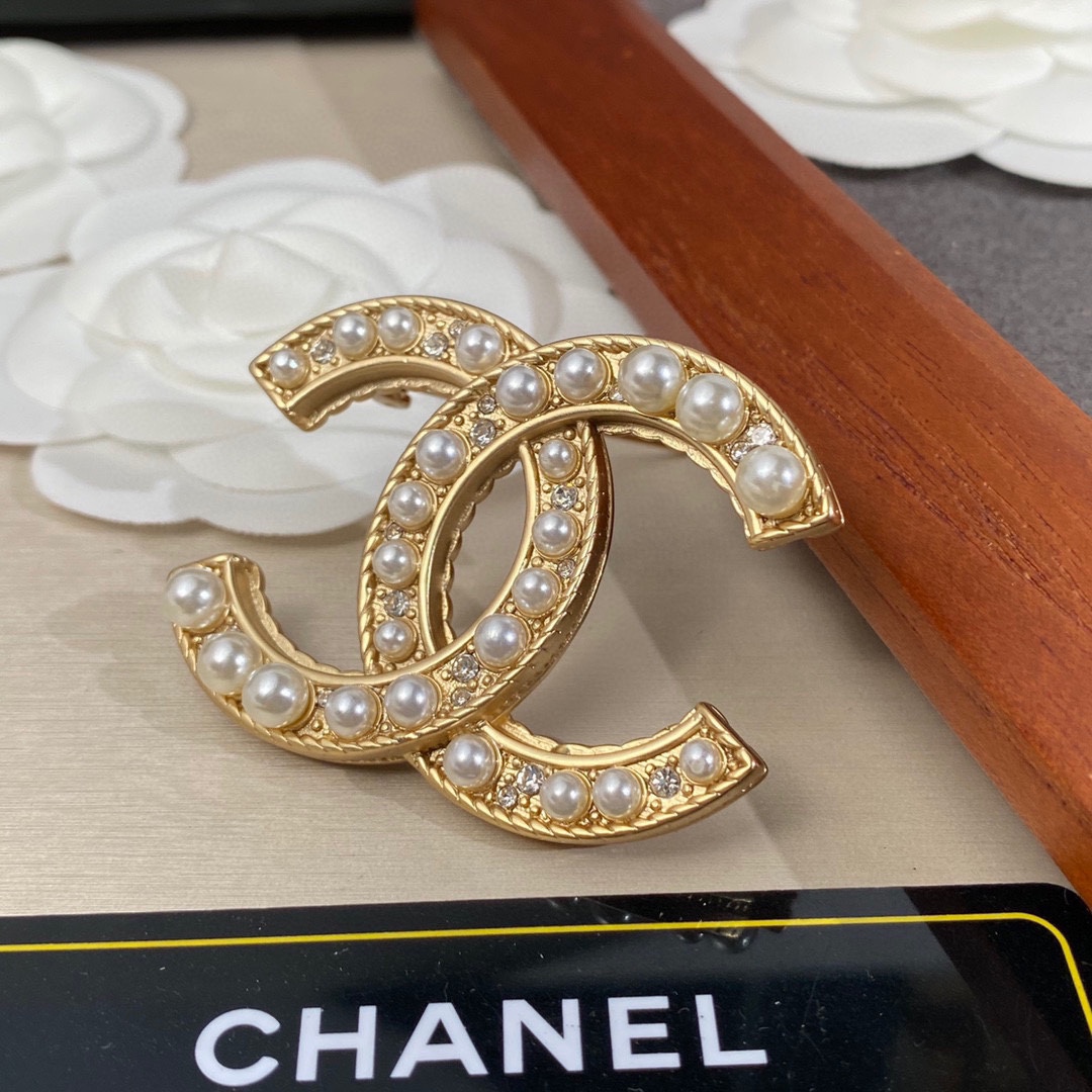 Ch**el Brooch